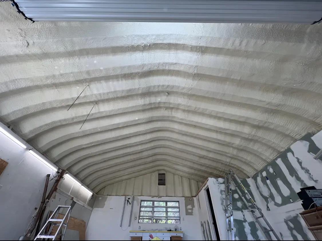 Spray polyurethane foam applied to the underside of a metal roof deck in West Mifflin